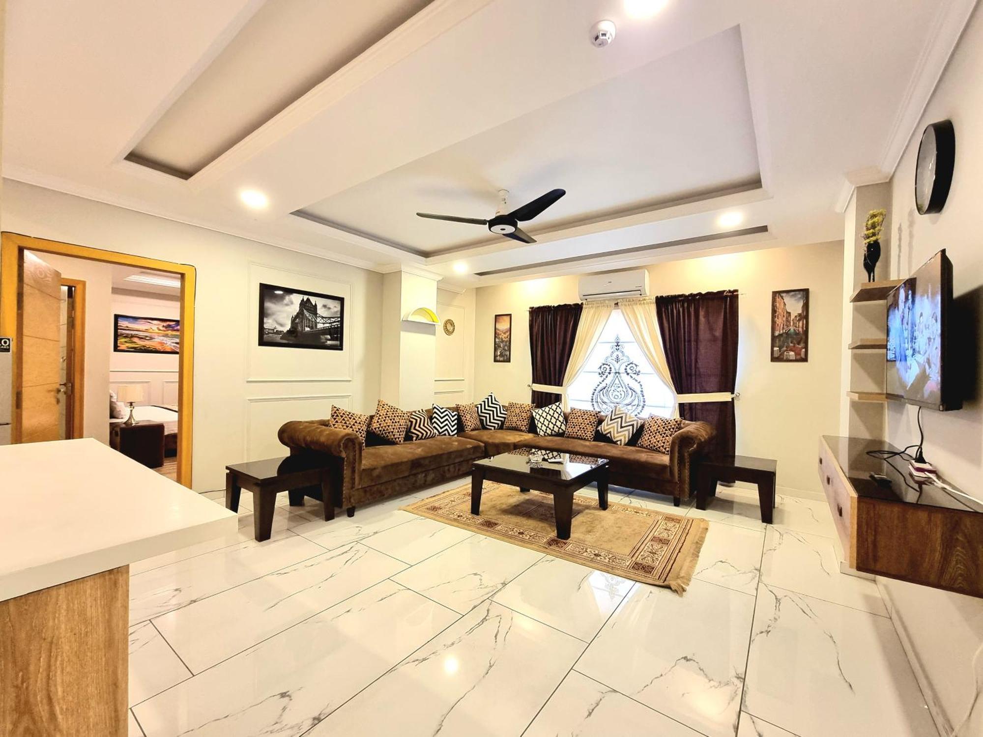 The Millenial Apartments & Suites Bahria Town Rawalpindi Quarto foto