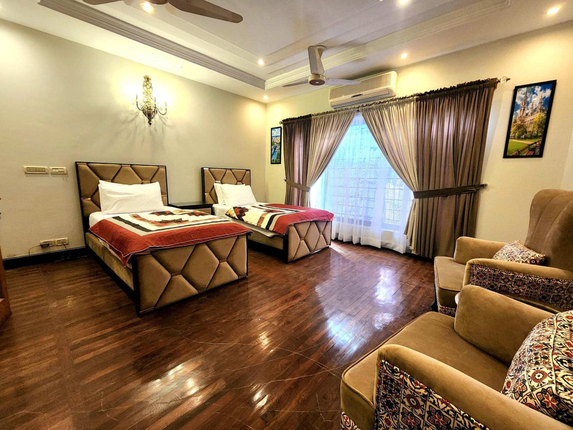 The Millenial Apartments & Suites Bahria Town Rawalpindi Quarto foto