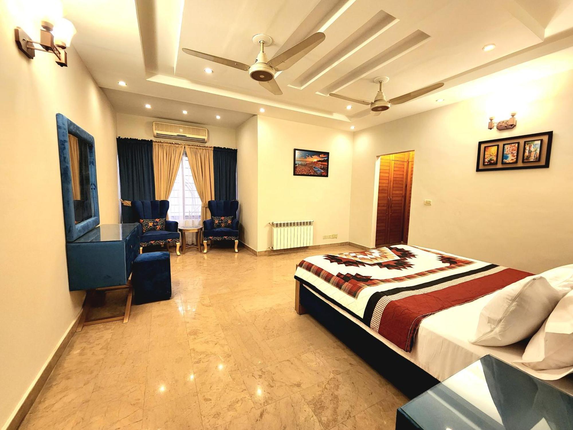 The Millenial Apartments & Suites Bahria Town Rawalpindi Quarto foto