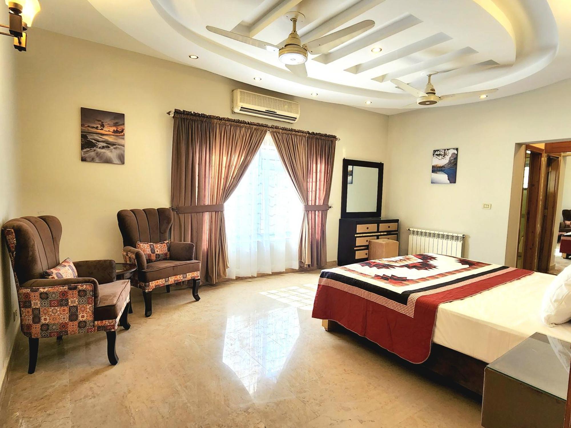The Millenial Apartments & Suites Bahria Town Rawalpindi Quarto foto