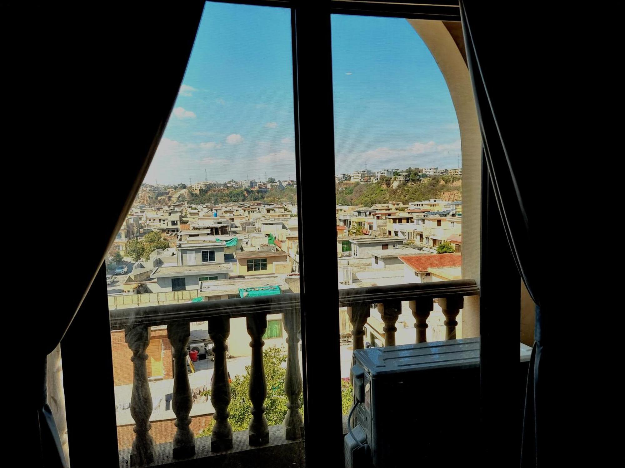 The Millenial Apartments & Suites Bahria Town Rawalpindi Quarto foto
