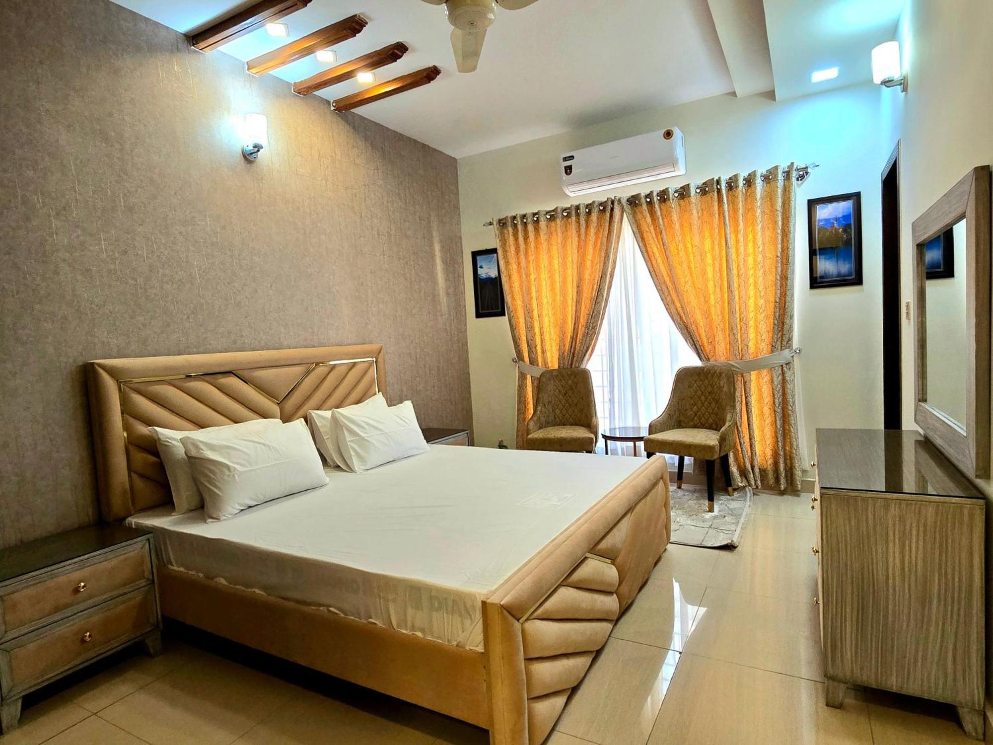 The Millenial Apartments & Suites Bahria Town Rawalpindi Quarto foto