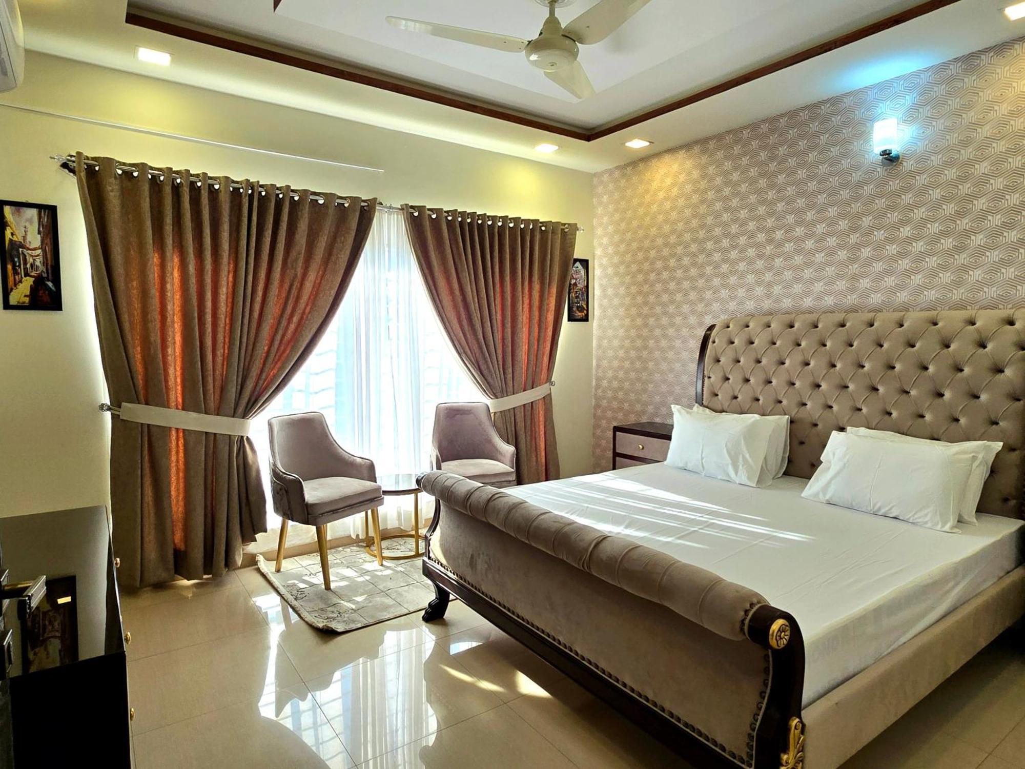 The Millenial Apartments & Suites Bahria Town Rawalpindi Quarto foto